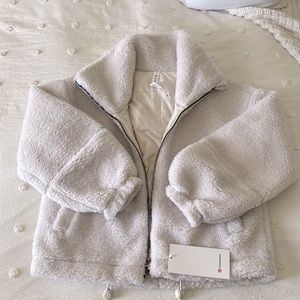 Lululemon cinchable fleece zip-up jacket. Size 6. White opal. New with tags!